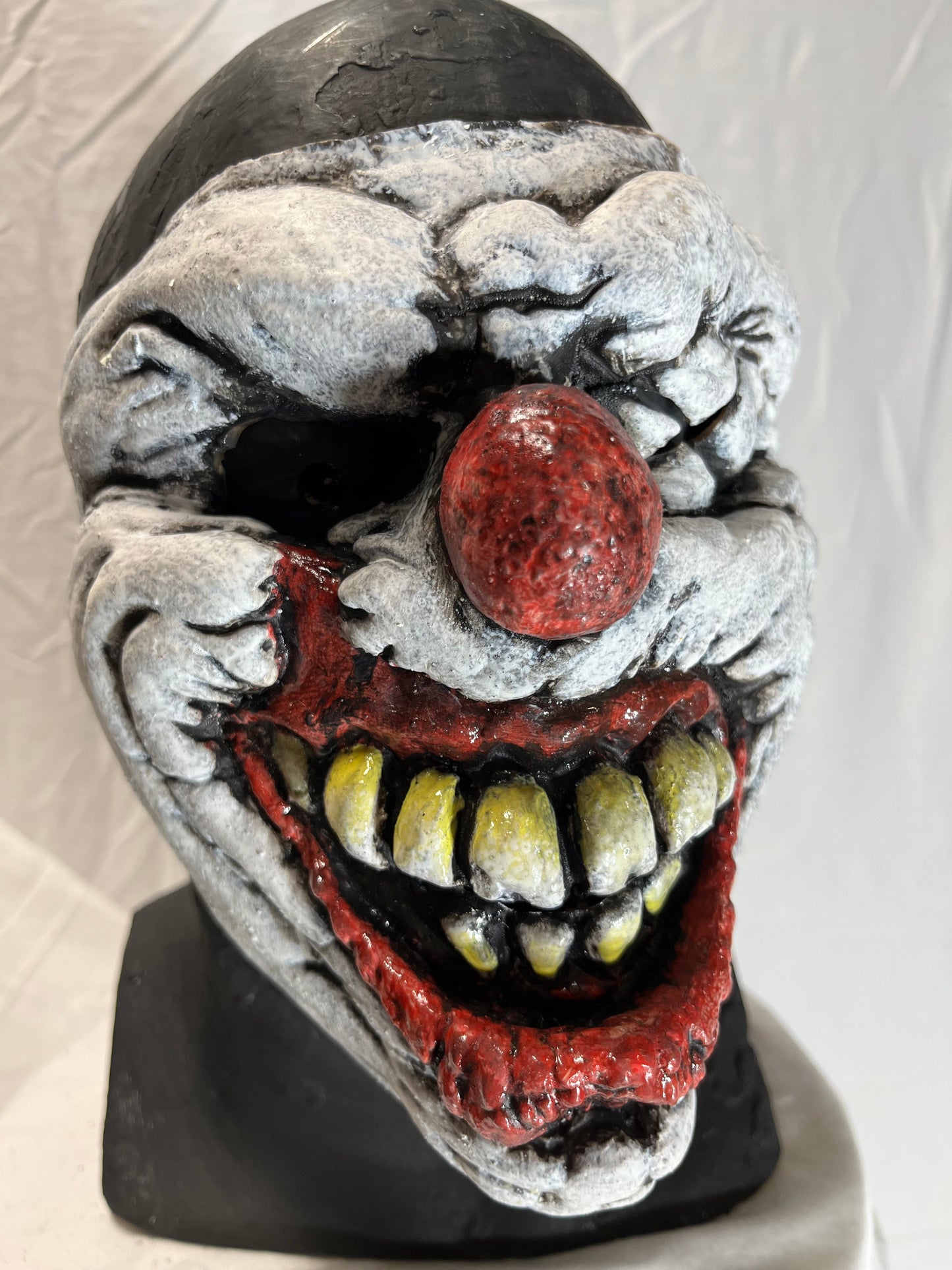 Smiling evil clown face mask